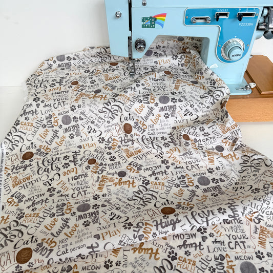 Timeless Treasures - Ball Of Yarn and Text - Natural