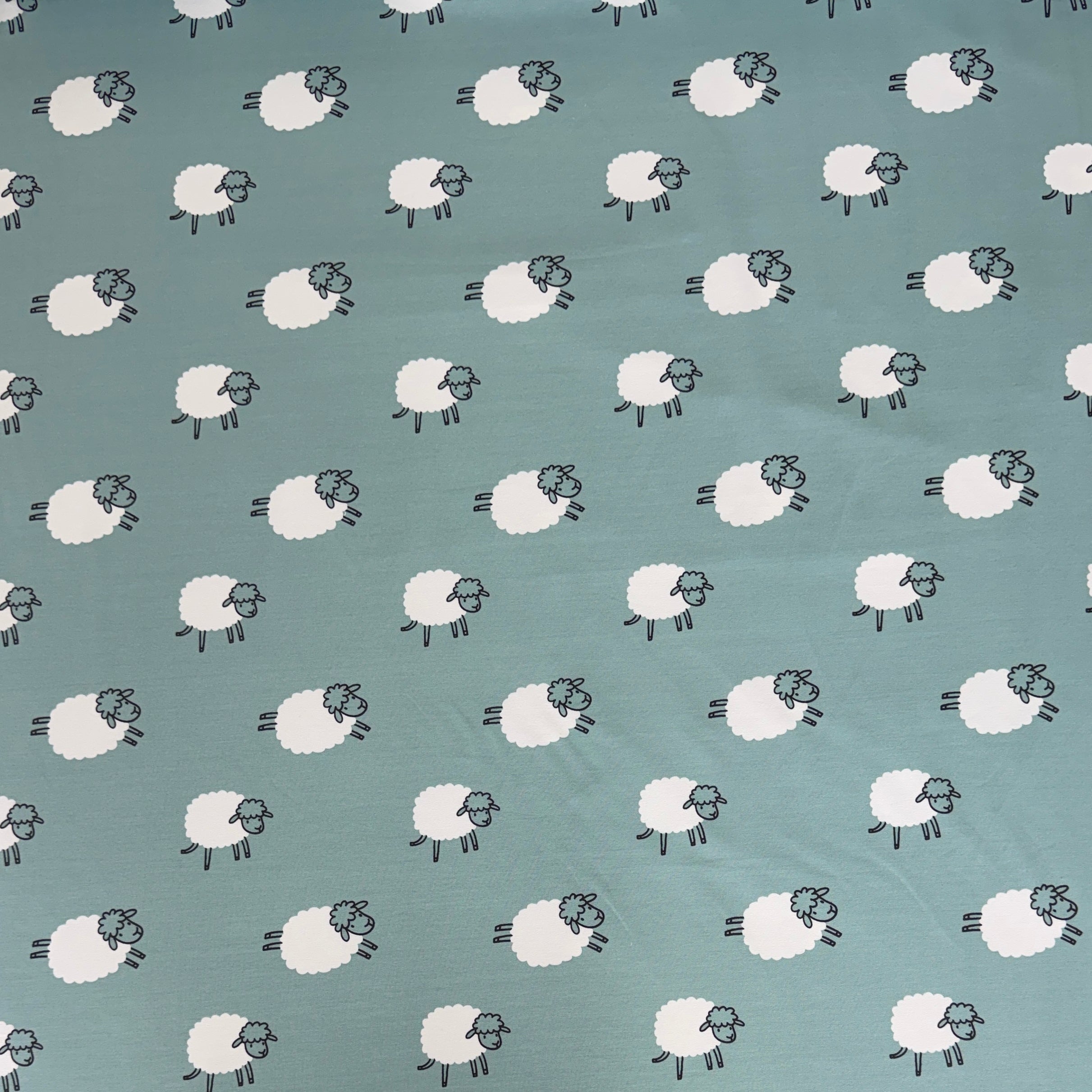 Frolicking Sheep French Terry Fabric in Dusty Teal