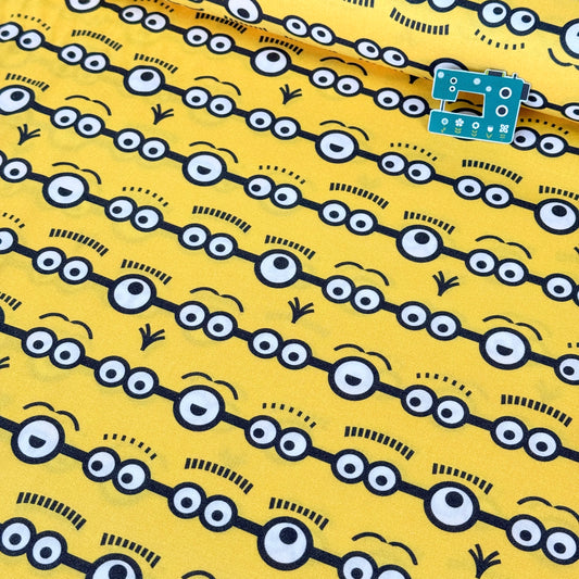 The Minions Stripe (Yellow) Fabric by Springs Creative