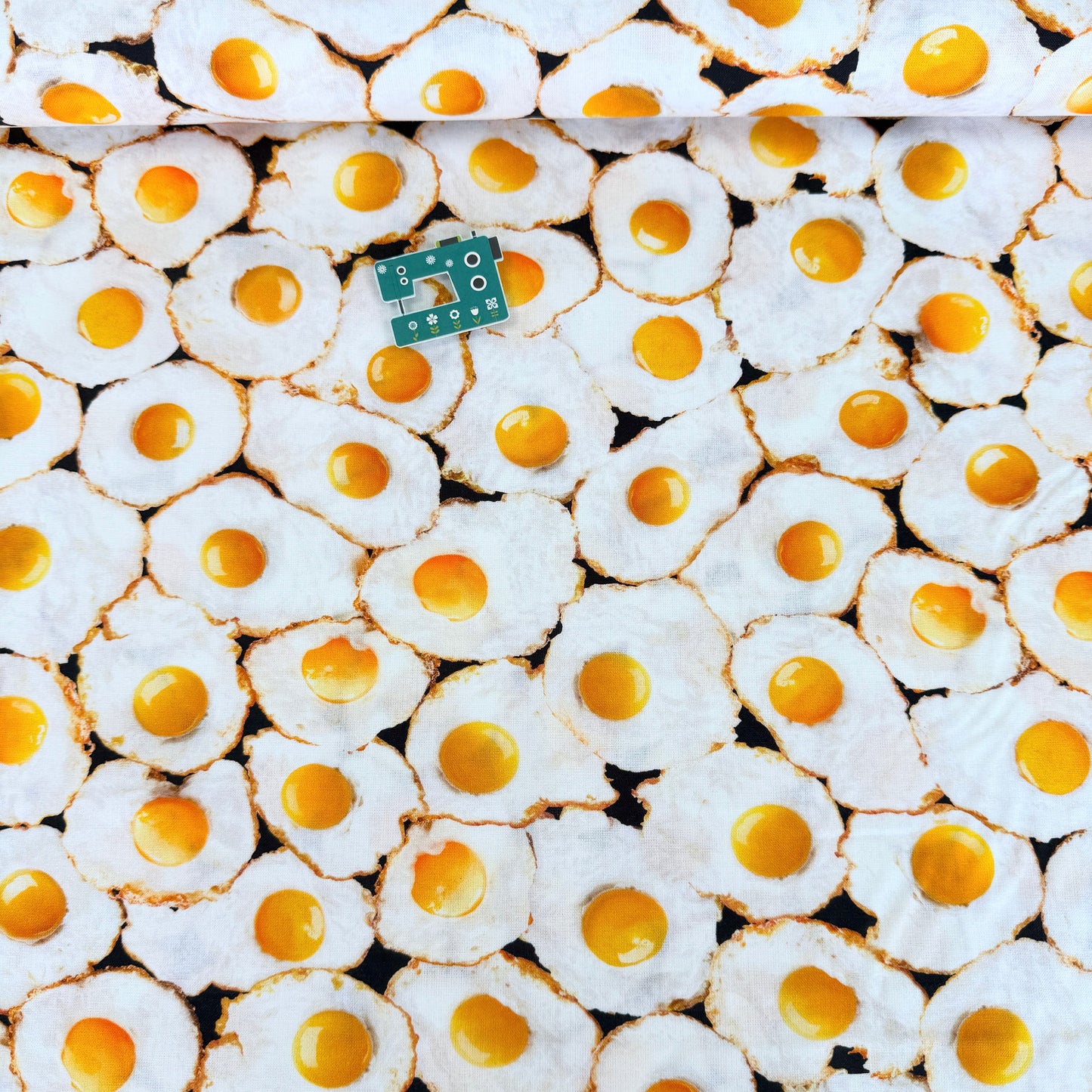 Fried Eggs (White) Fabric by Timeless Treasures