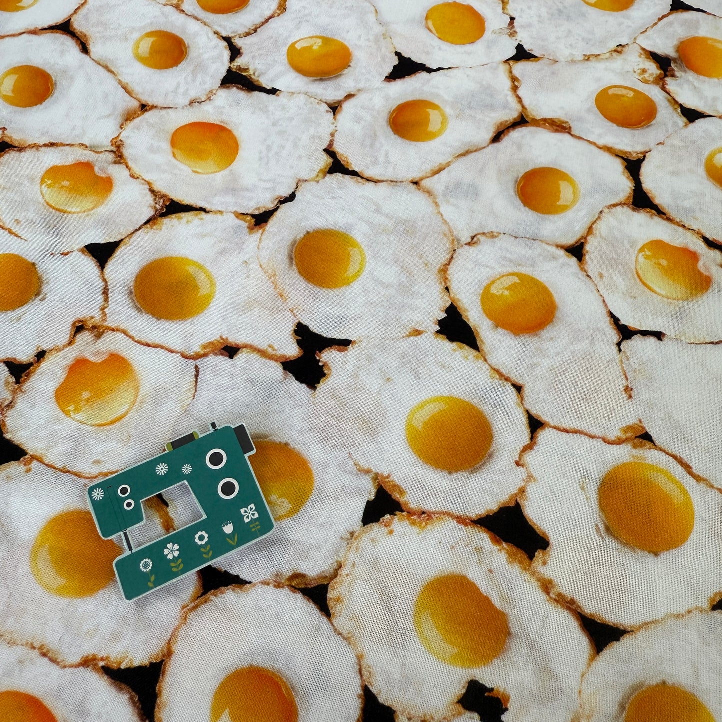 Fried Eggs (White) Fabric by Timeless Treasures