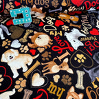 Happiness is Pawsome Dog (Black) Fabric by Timeless Treasures