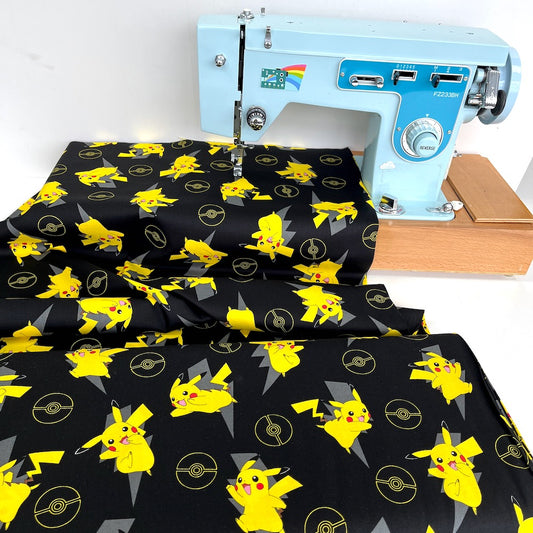 Robert Kaufman Fabric - Pokemon Pikachu Lightning Ball - Black