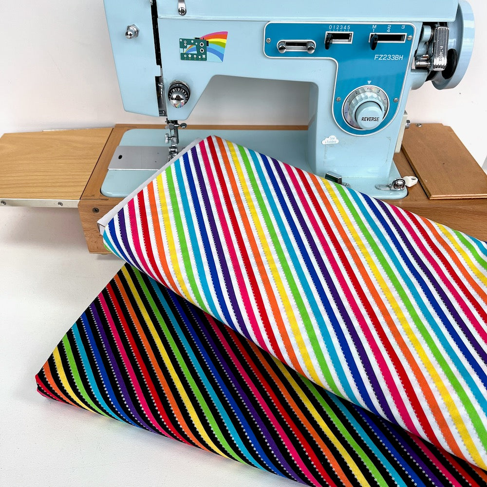 Anthology Fabrics - Be Colourful Metallic Rainbow - White