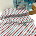 Remnant of Timeless Treasures Fabric - Holiday Diagonal Stripes - Multi (142cm)