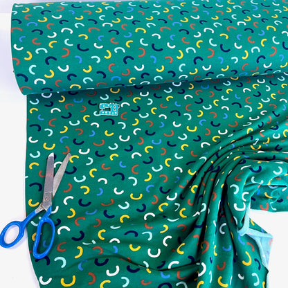 GOTS Soft Sweat Fabric - Scattered Rainbows - Green