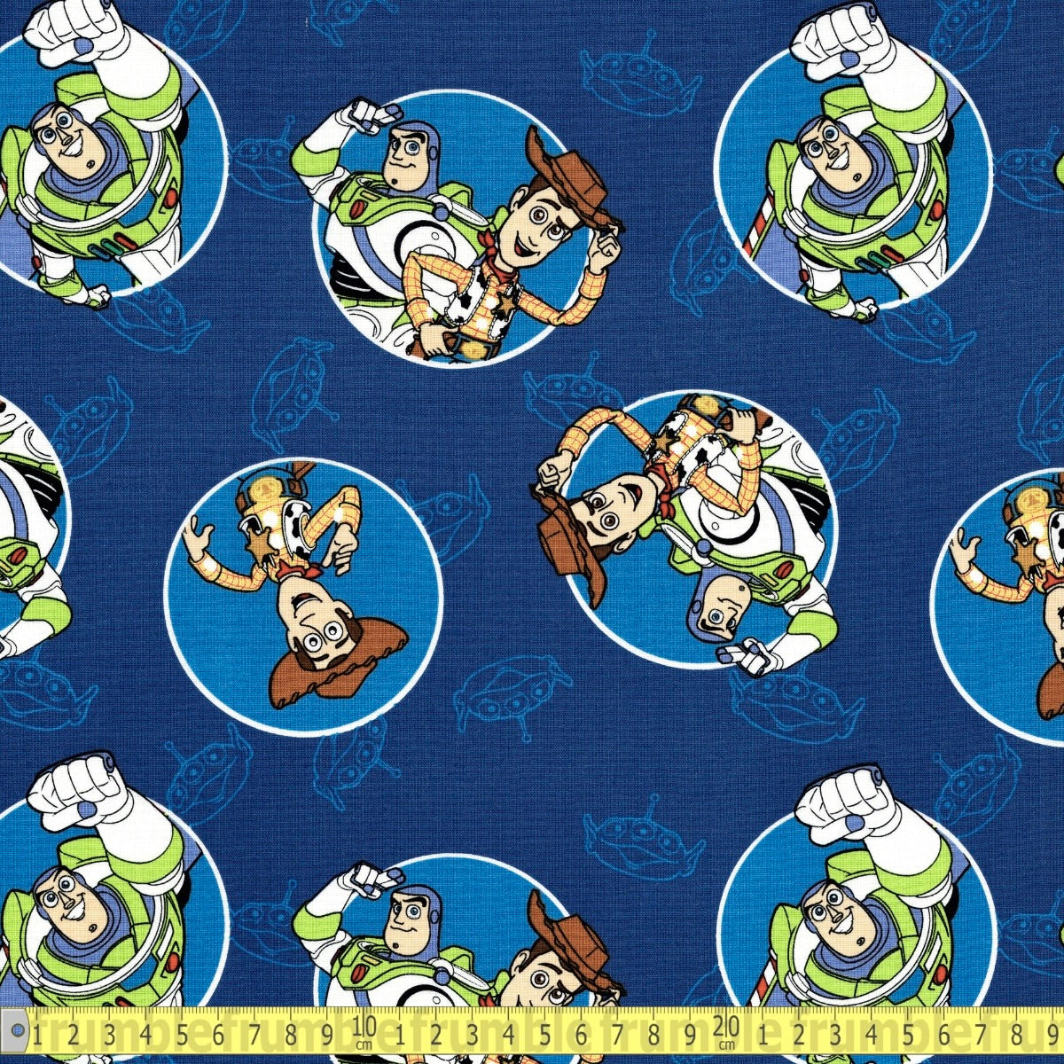 Toy Story Buzz and Woody Badges (Blue) Fabric by Springs Creative