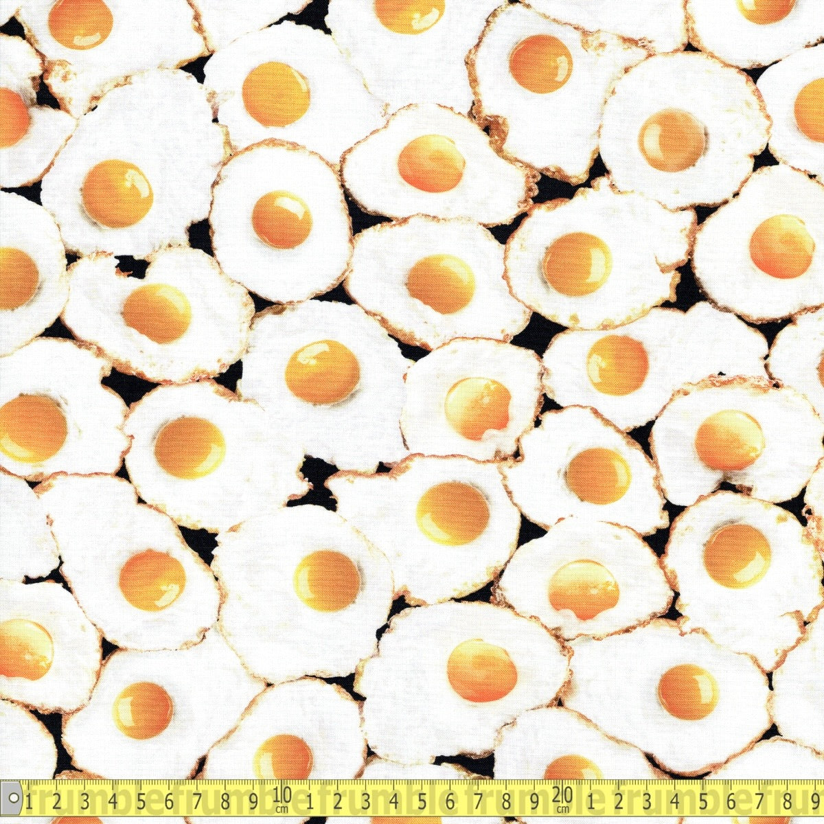 Fried Eggs (White) Fabric by Timeless Treasures