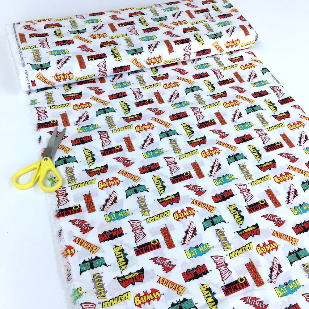 Quilting Cotton - DC Heroes & Heroines - Batman Logo History White (Per Metre)