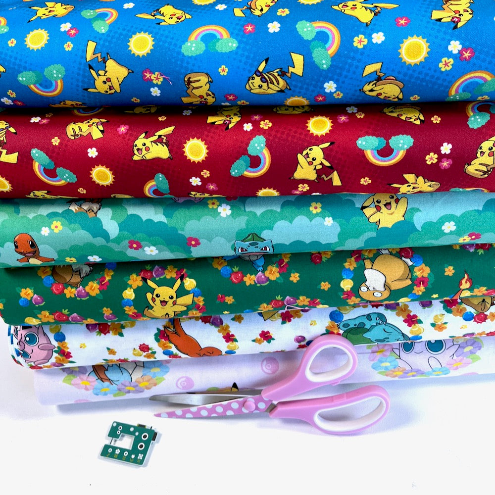 Robert Kaufman - Sunny Days Pokemon - Pikachu and Rainbows Blue