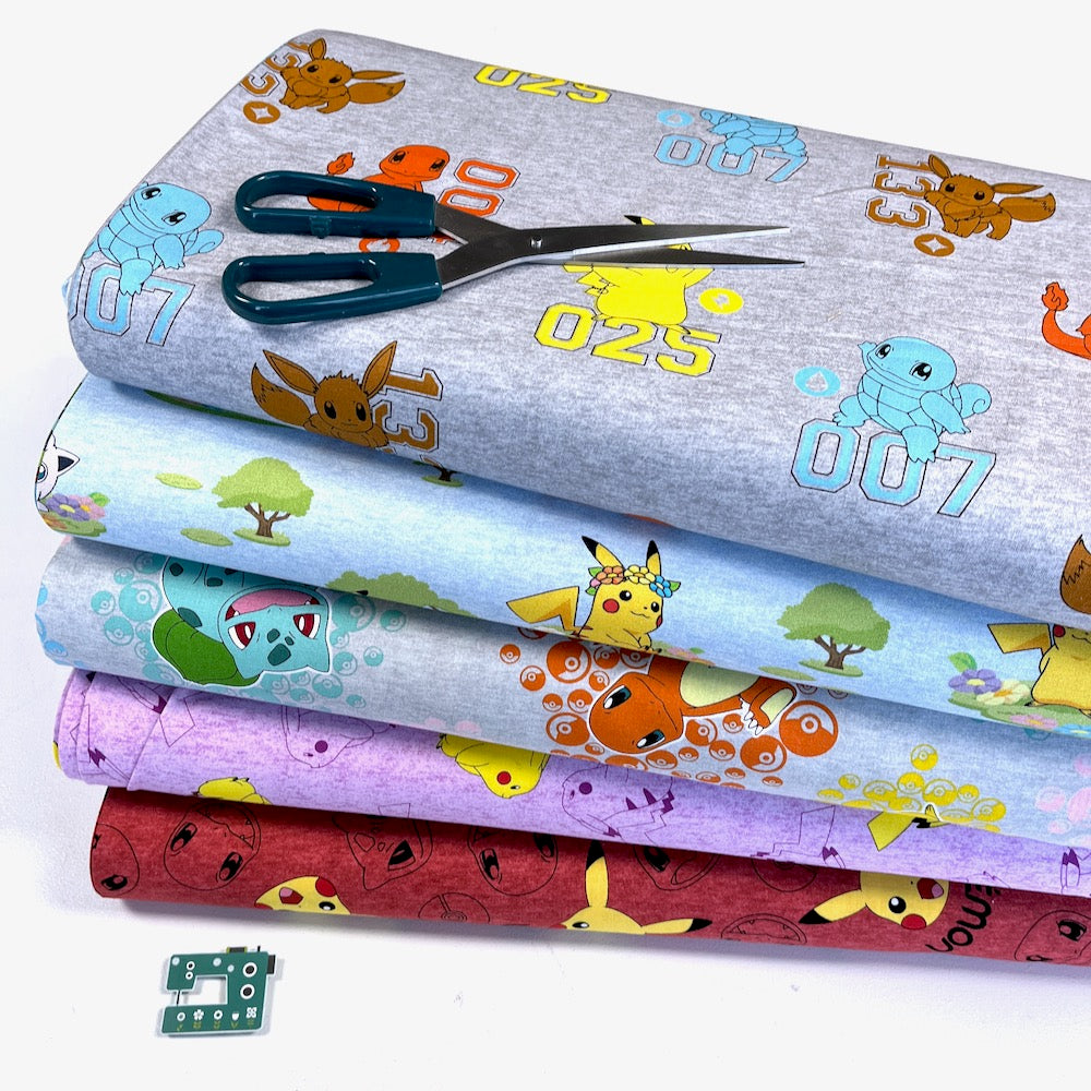 Robert Kaufman - Sunny Days Pokemon - Pikachu and Rainbows Blue