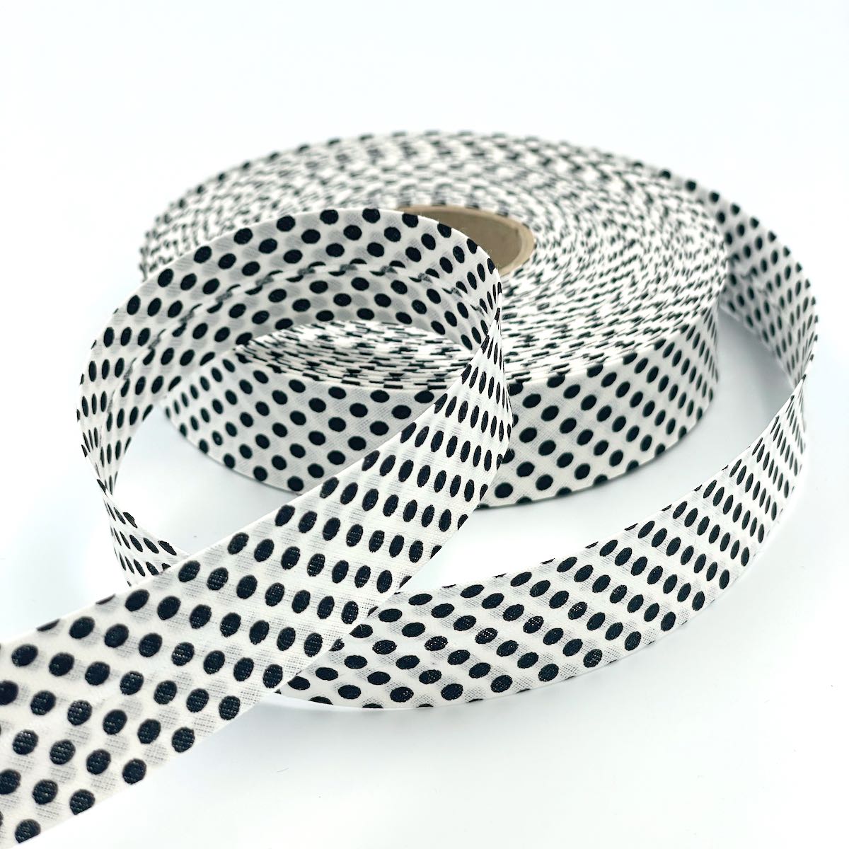 25m Reel of 25mm Reverse Polka Dot Bias Binding