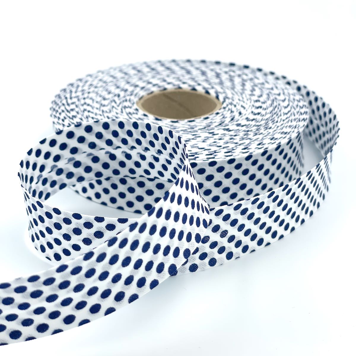 25m Reel of 25mm Reverse Polka Dot Bias Binding