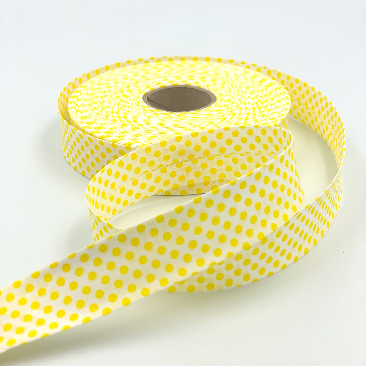 25m Reel of 25mm Reverse Polka Dot Bias Binding